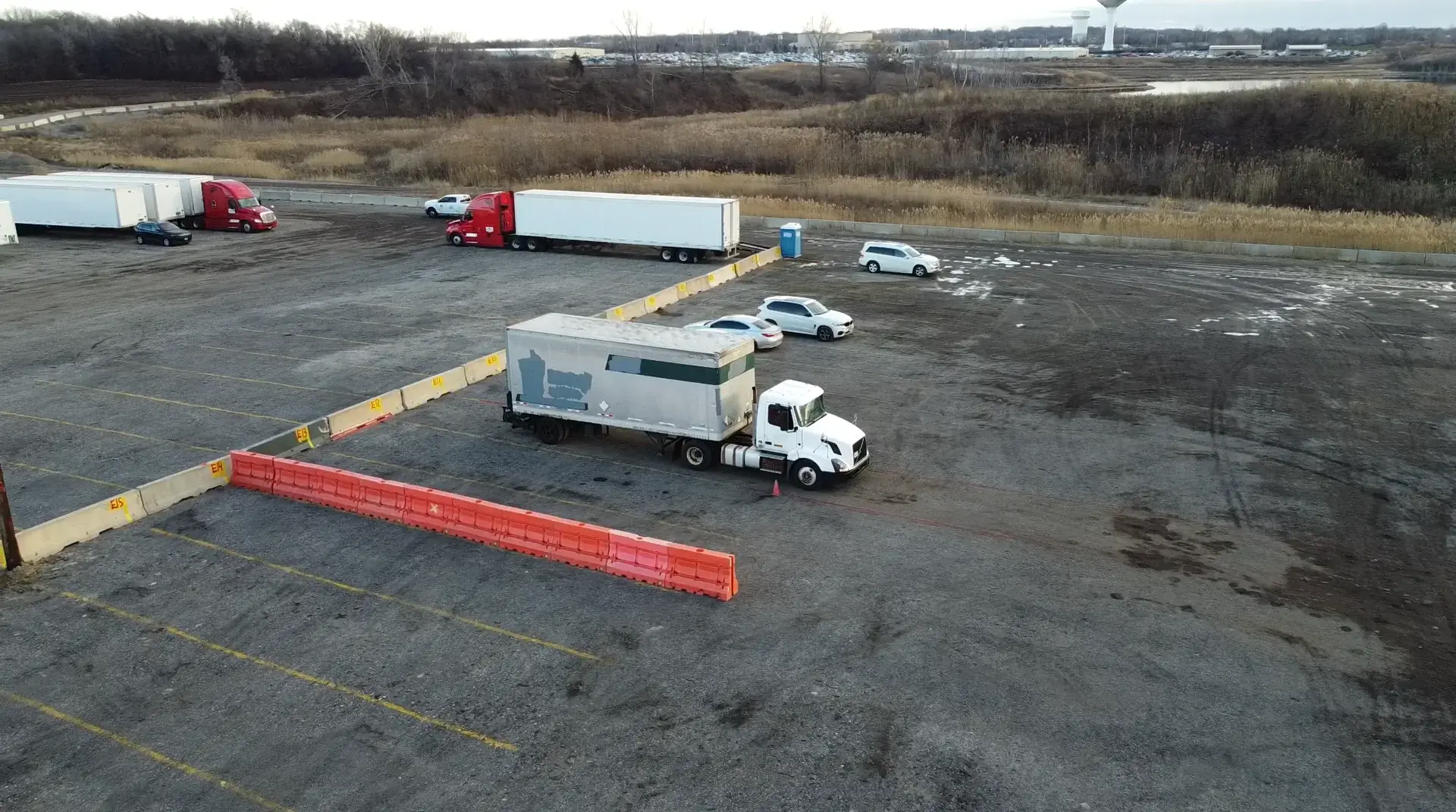 Aerial view of the All-In CDL Zion training yard with a semi-truck and cones